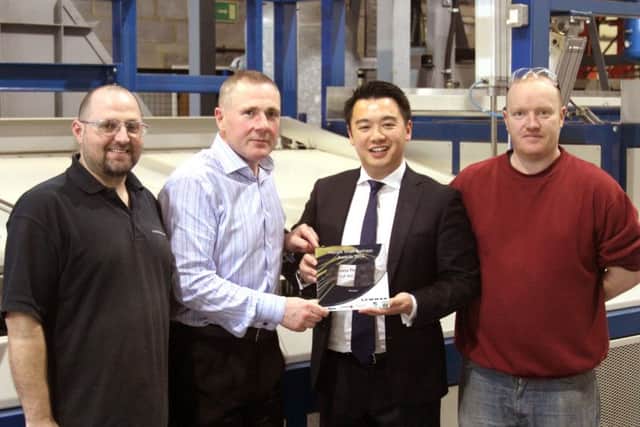 From left, Lewmar staff Mark Wood, Peter Tierney and Matthew Freeland with Alan Mak MP, second right
Picture: Barry Zee