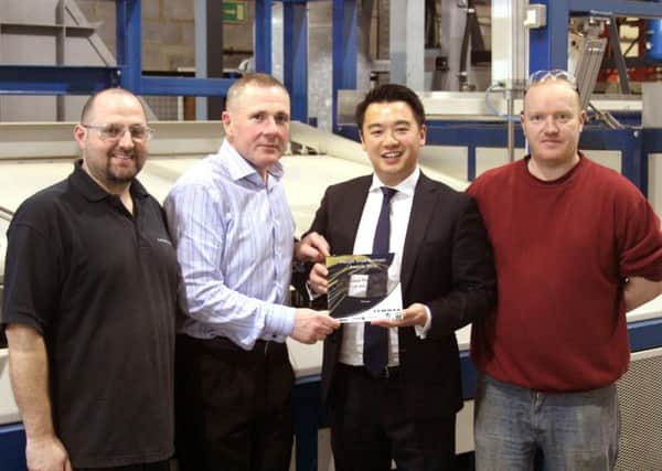 From left, Lewmar staff Mark Wood, Peter Tierney and Matthew Freeland with Alan Mak MP, second right 


Picture: Barry Zee