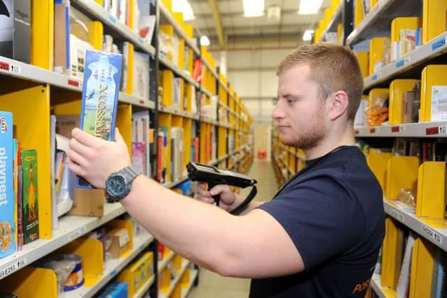 Dan Watson, 22, a supervisor at the new Amazon depot in Segensworth. Picture: Sarah Standing (160645-5194)