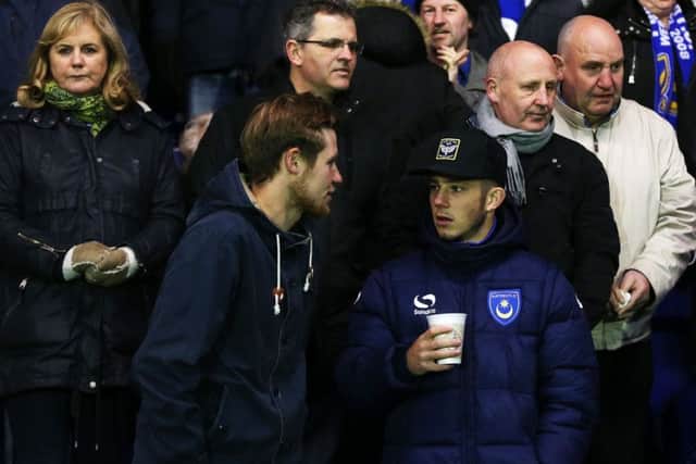 Conor Chaplin missed out due to injury on Tuesday and watched the game with Pompey fans instead. Picture: Joe Pepler