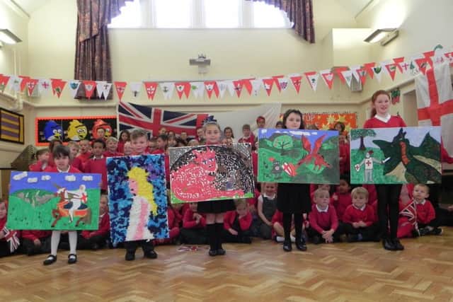 Whole school photo with art work linked to St George