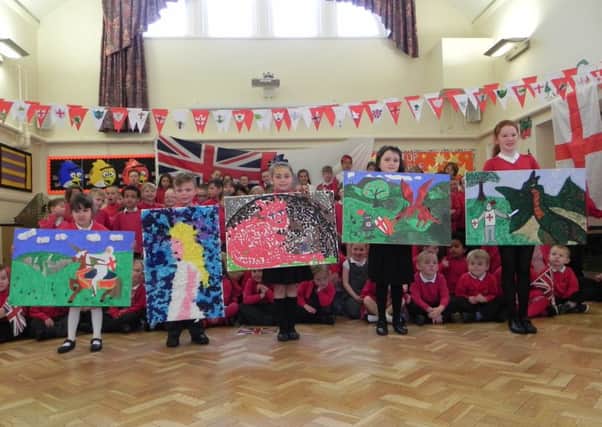 Whole school photo with art work linked to St George