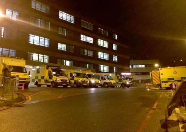 Ambulances queueing outside QA hospital on
Monday, February 22- at most there were 16 waiting to deliver patients