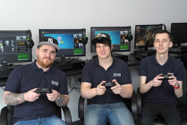 XOAB gaming lounge in Albert Road, Southsea opened at the weekend. From left, co-owners Guy Davies and Matthew Walden with member of staff Matthew Wills Picture: Paul Jacobs (160244-4)