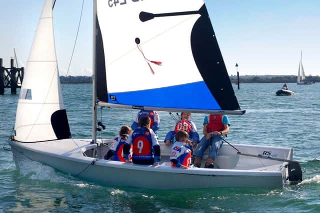 RS Venture on the water, similar to the Harbour Schools new boat