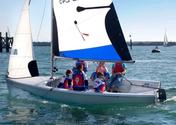 RS Venture on the water, similar to the Harbour Schools new boat