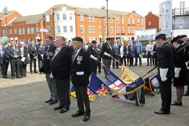 Former crew members of HMS Sheffield take part in a service of remembrance at the Falklands Memorial in Old Portsmouth  Picture Ian Hargreaves  (160591-1)