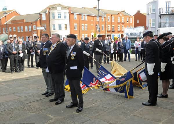 Former crew members of HMS Sheffield take part in a service of remembrance at the Falklands Memorial in Old Portsmouth  Picture Ian Hargreaves  (160591-1)