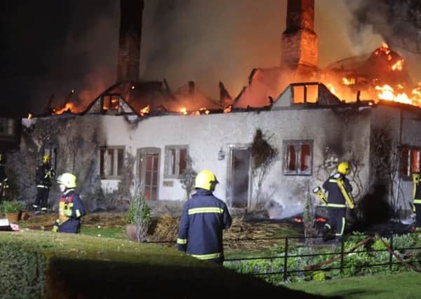 Firefighters tackling a blaze at a house near Petersfield Picture: Hampshire Fire and Rescue