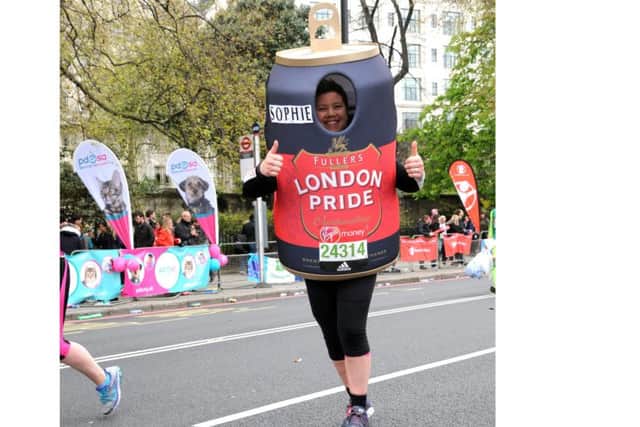 Sophie Exton-Woodford dressed as a London Pride can in the London Marathon