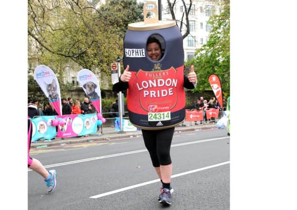 Sophie Exton-Woodford dressed as a London Pride can in the London Marathon
