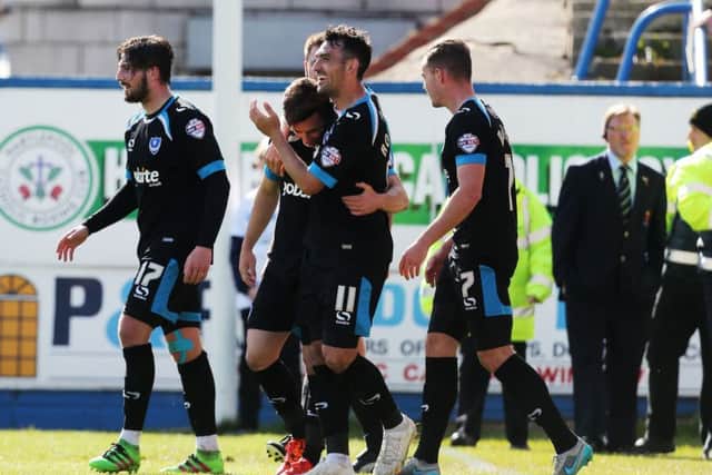 Conor Chaplin is congratulated following his goal Picture: Joe Pepler