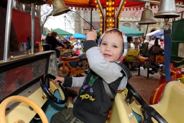 Ethan Longden, from North End, rings the bell on the fire engine (160655-6187)