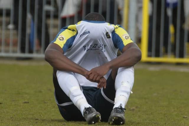 Shamir Mullings tries to hide his disappointment Picture: Mick Young