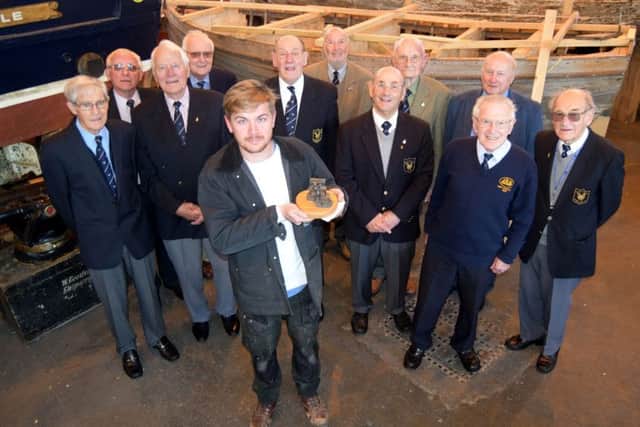Richard Atherton of Petersfield, the first winner of the award funded by the Association of Royal Naval Shipwrights, flanked by members of the group