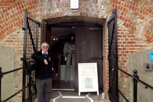John Bevan at the entrance to the museum