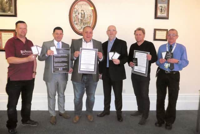 From left, Kevin Warne from Sweets For U, Wetherspoons manager James Hardman, head of Portsmouth Business Crime Reduction Partnership Chris Caesar, Gareth Lewis from Southern Co-operative, general manager at Liquid and Envy David Joyce and University of Portsmouth security manager Chris Beaman