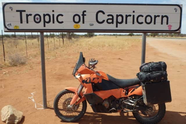 John Twilley's bike at the Tropic of Capricorn in Namibia