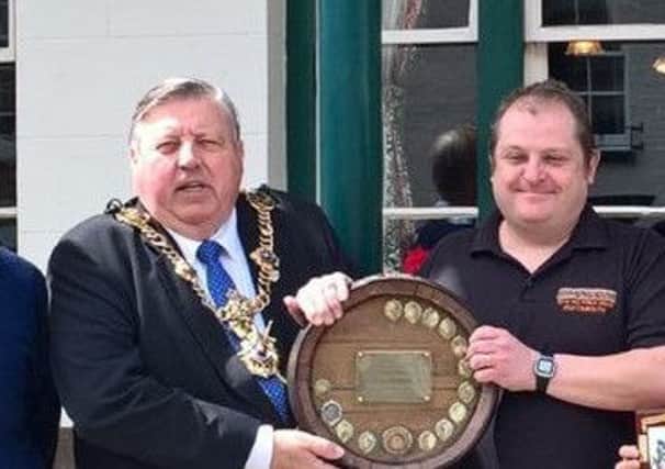 Lord Mayor of Portsmouth, Cllr Frank Jonas, presenting Jonathan McKerracher, landlord of The Hole In The Wall, in Southsea, with the Campaign for Real Ale's Portsmouth and south-east Hampshire pub of the year award