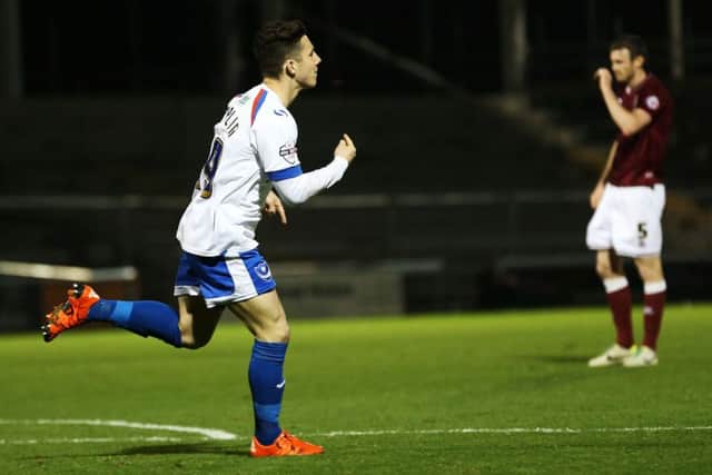 Conor Chaplin celebrates his goal at Sixfields in December. Picture: Joe Pepler