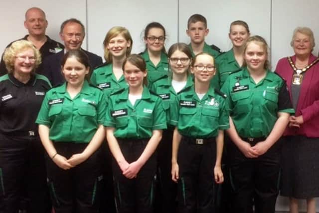 Back row: volunteer Vince Purse,  Cllr. Mike Fairhurst, cadets Chloe Wadsworth, Jasmine Poor, Yiannis Razzell and Rosie Purse,  Mayor Cllr Leah Turner, Mayor's Consort - Andy Cousins. Front row: volunteer Bev Stotesbury, and cadets Samantha Poor, Hazel Cowan, Jasmine White, Phoebe Carlile, and Chloe Gamblin