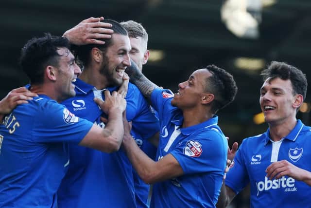 Pompey celebrate during their 4-0 thrashing of Notts County at Fratton Park. Picture: Joe Pepler