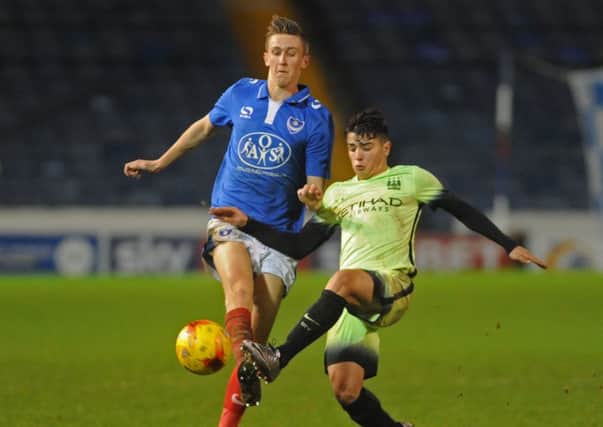 Adam May, left, in FA Youth Cup action for Pompey Academy against Manchester City     Picture: Ian Hargreaves