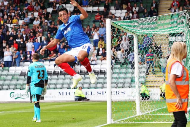 Gary Roberts celebrates scoring at Home Park earlier in the season Picture: Joe Pepler