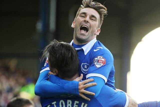Ricky Holmes, celebrating a goal with with Miles Storey, enjoyed his time at Fratton Park even though his stay there was cut short
