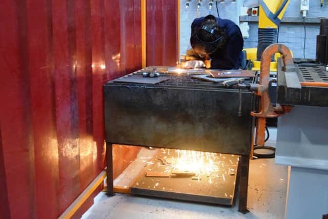 Joe Catcheside, 21, of Portsmouth, at the BAE Skills Centre Picture: BAE Systems