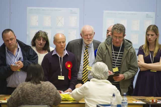 Labour and Consevative leaders Mark Smith and Cllr Mark Hook watch the count at Gosport Leisure Centre
Picture: Steve Reid Blitz Photography