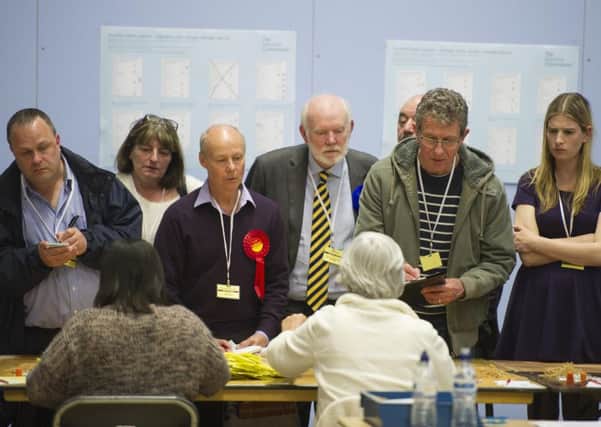 Labour and Consevative leaders Mark Smith and Cllr Mark Hook watch the count at Gosport Leisure Centre 
Picture: Steve Reid Blitz Photography