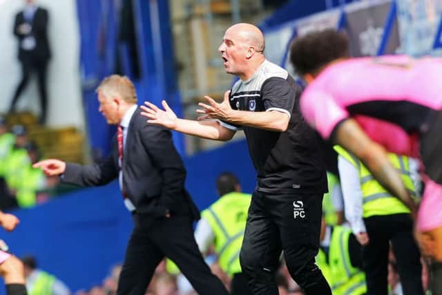 Pompey boss Paul Cook tries to rally his troops Picture: Joe Pepler