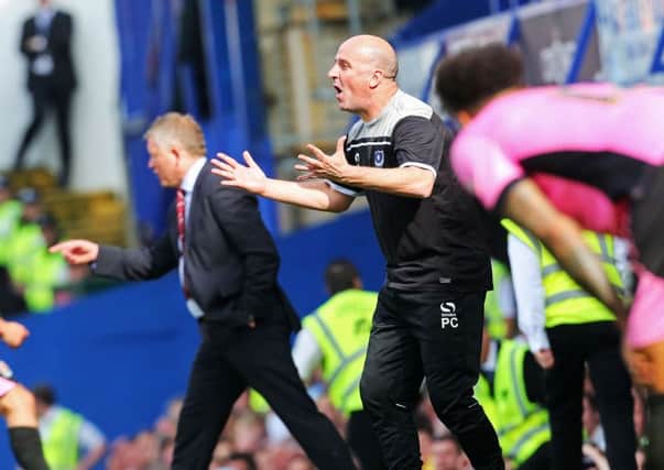 Pompey boss Paul Cook tries to rally his troops Picture: Joe Pepler