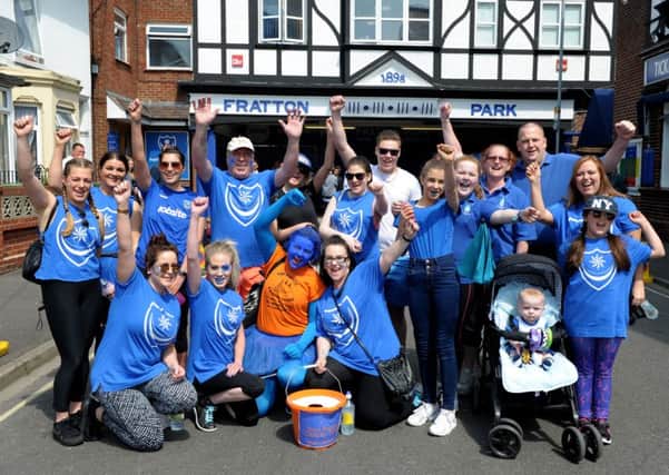 7/5/16

Blue Day fundraising walkers leave Fratton Park, heading for Gunwharf Quays along an 8 mile route.

Picture: Paul Jacobs (160250-2) PPP-160705-185613006