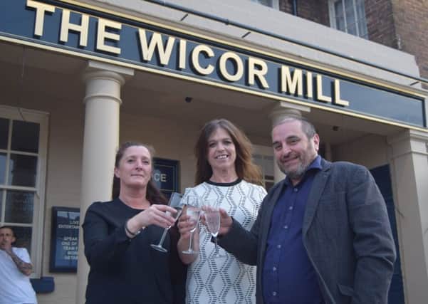It's cheers all round with, from the left, chef Teresa Ross, manager Lorraine Lundbech and owner Steve Hudson