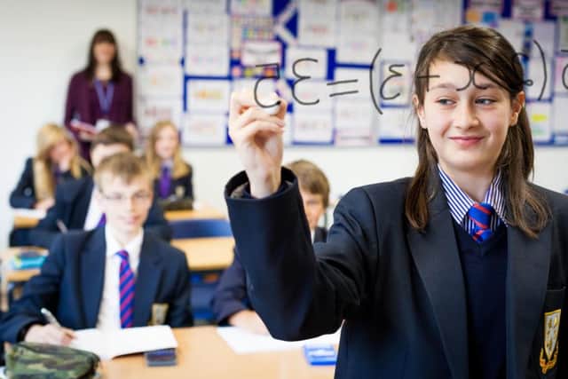 Schools have been told they won't be forced to become academies