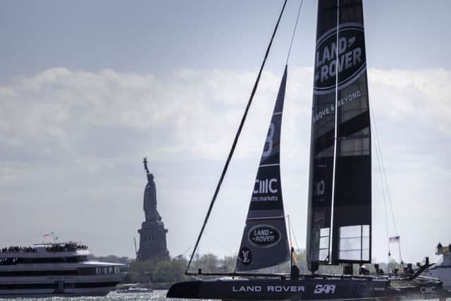 Land Rover BAR sail past the Statue of Liberty Picture: Harry KH/Land Rover BAR
