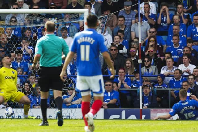 Jack Whatmoughs deflection goes past Pompey keeper Brian Murphy to hand Northampton the lead at Fratton Park on Saturda Picture: Barry Zee