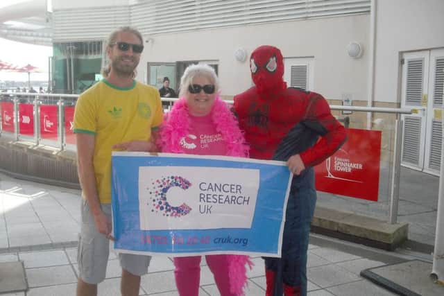 From left: Andrew Hayward, 34, Jeannette Hayward, 59, Chris Hayward, 37, who abseiled down the Spinnaker Tower