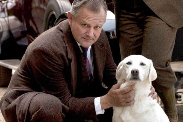Hugh Bonnevlle as Robert Grantham with Isis the dog in Downton Abbey