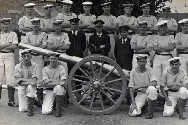 171111 REMEMBER WHEN REP: BH
CAPTION: Here we see the gun-run champions of 1929. They all look fit and well. Can you recognise anyone from this eighty-two year old photograph?
GUN RUN CHAMPIONS
Pictured some eighty years ago we see the champion gun running team of 1929. Notice how fit and handsome all the boys are. In the posed photograph are the instructing sub-lieutenant and two petty officers.
The boys seem to be wearing long sleeved white fronts. I have never seen these in a photograph before. Can anyone enlighten me on these please.
PICTURE: Submitted by Ray Childs ENGPPP00120111116093357