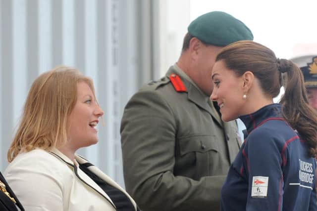 The Duchess of Cambridges peaking with Donna Jones in July 2015. Picture: Sarah Standing