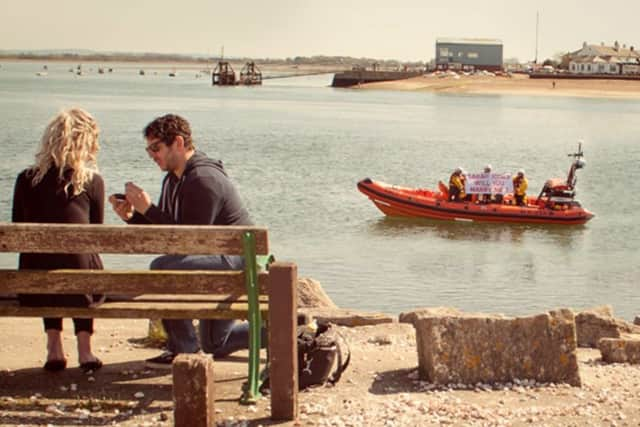 Mark Hummerstone proposes to Sarah Jones by the waterfront in Eastney