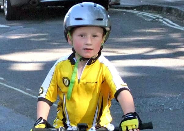 Samuel Whitehead has achieved three cycling awards after completing a 50km ride for charity.