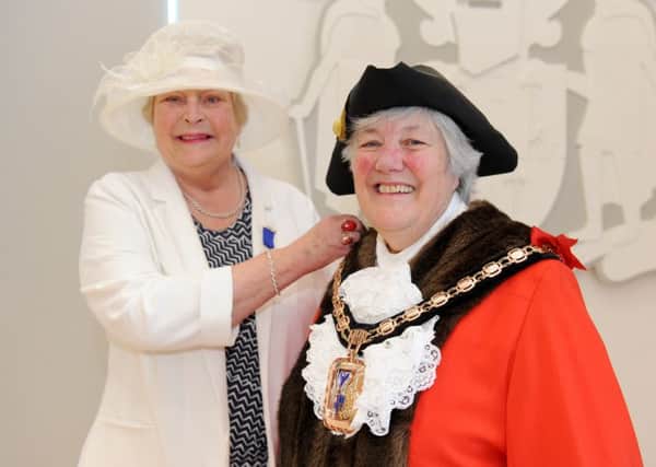 The outgoing Mayor of Havant Leah Turner, left, with the new Mayor Faith Ponsonby 

Picture: Sarah Standing (160672-7895)