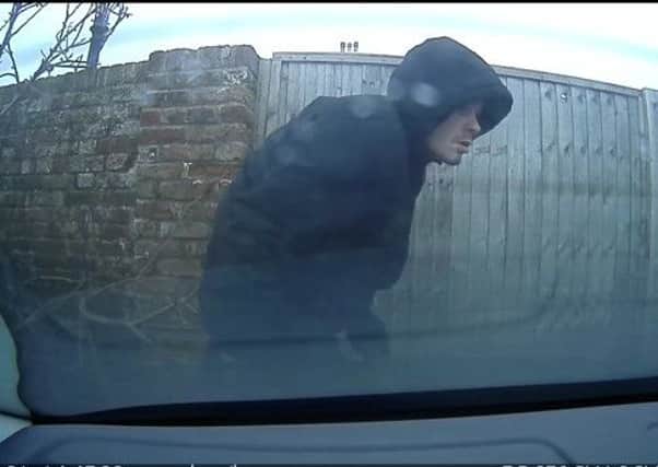 CCTV from inside a car at the Harvester in Eastern Road, Portsmouth showing Christopher Walker about to break in