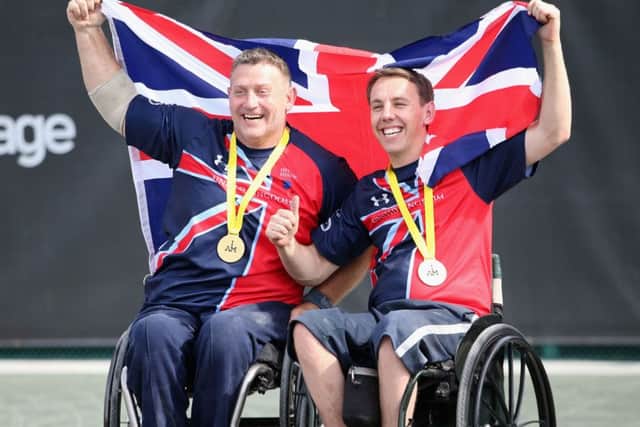 UK wheelchair doubles tennis champions Andy McErlean, left, and Alex Krol celebrate after winning gold at the Invictus Games Picture: Chris Jackson/PA Wire