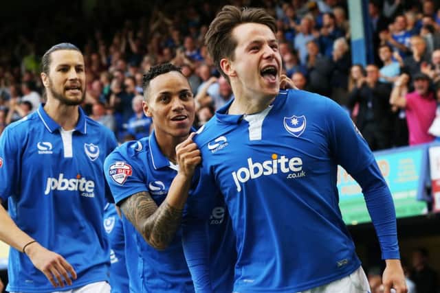 Kyle Bennett celebrates the opening goal with scorer Marc McNulty. Picture: Joe Pepler