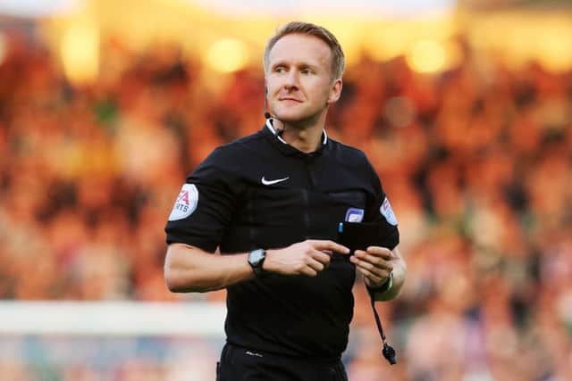 Referee Oliver Langford missed Plymouth striker Jamille Matt's headbutt on Pompey skipper Michael Doyle last night    Picture: Joe Pepler